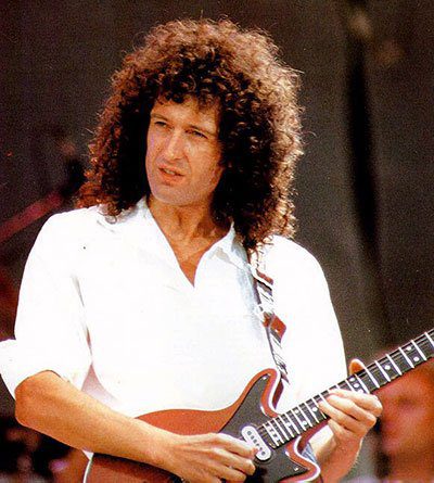 Brian May playing his signature guitar, the Red Special