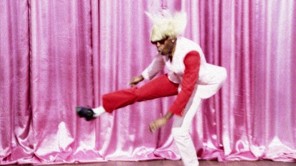 A screenshot from tyler the creator igor music video for "WHAT'S GOOD"